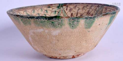 A MIDDLE EASTERN POTTERY BOWL. 24 cm wide.