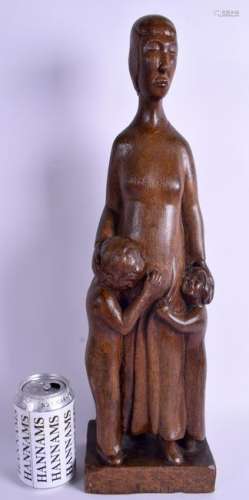 A STYLISH 1950S CARVED EUROPEAN WOOD FIGURE OF A FEMALE