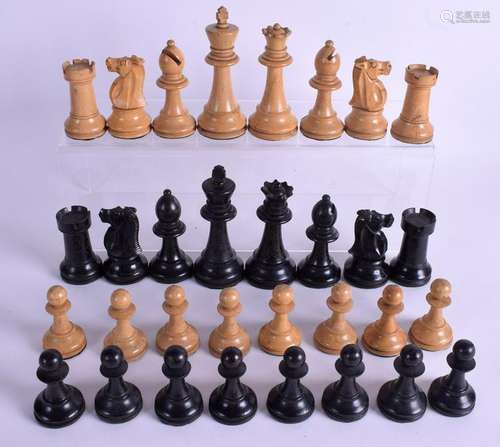 A VINTAGE TOURMANENT SIZE BOXWOOD AND EBONY CHESS SET.