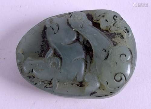 A CHINESE HARDSTONE TOGGLE. 3 cm x 4 cm.