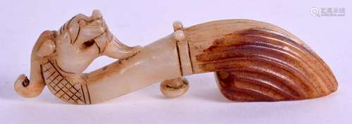 A CHINESE CARVED JADE BELT HOOK. 10 cm long.