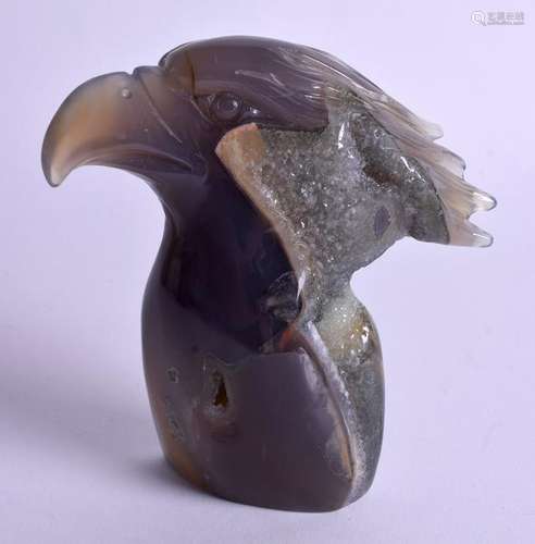 A CARVED AGATE HAWK HEAD. 12 cm x 9 cm.