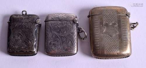 THREE SILVER VESTA CASES. (3)