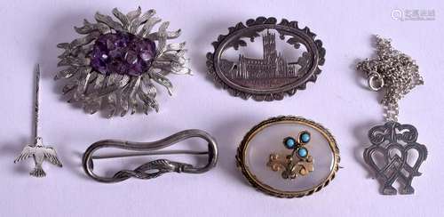 FIVE VINTAGE SILVER BROOCHES together with an early