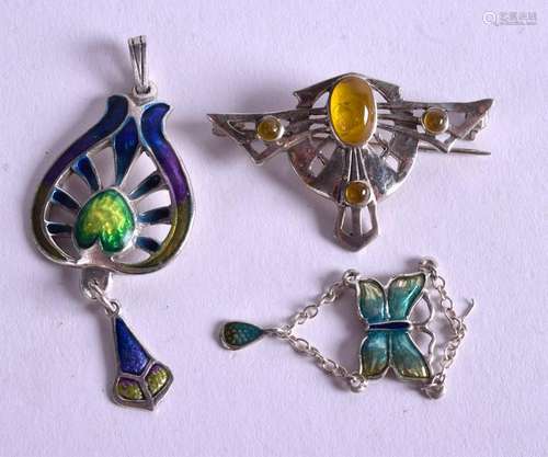 THREE SILVER ARTS AND CRAFTS SILVER PENDANTS. (3)