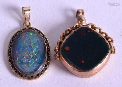 TWO GOLD AND OPAL PENDANTS. (2)