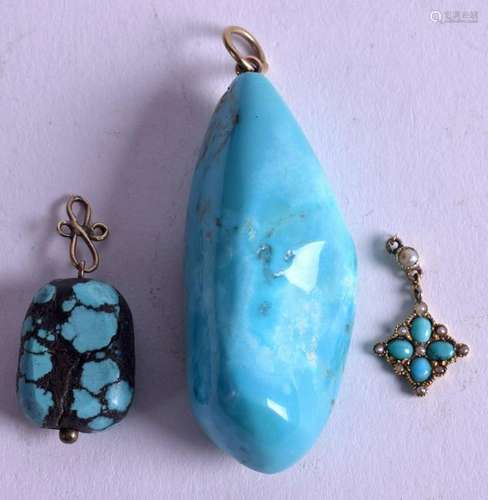 THREE GOLD AND TURQUOISE PENDANTS. (3)