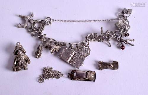 A SILVER CHARM BRACELET. 57 grams.