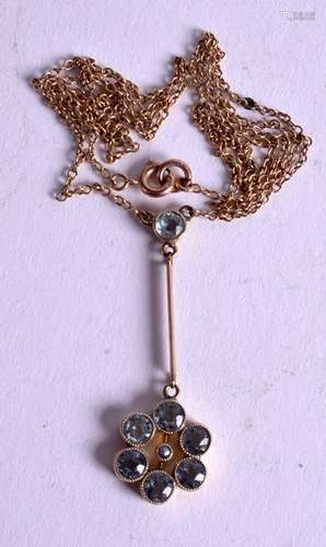 A GOLD AQUAMARINE NECKLACE. 2.6 grams.