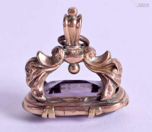 AN ANTIQUE GOLD AND AMETHYST FOB. 8.1 grams. 2.25 cm