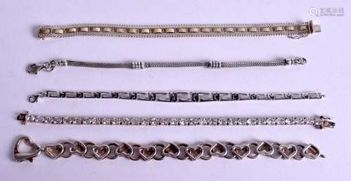 FIVE SILVER BRACELETS. (5)