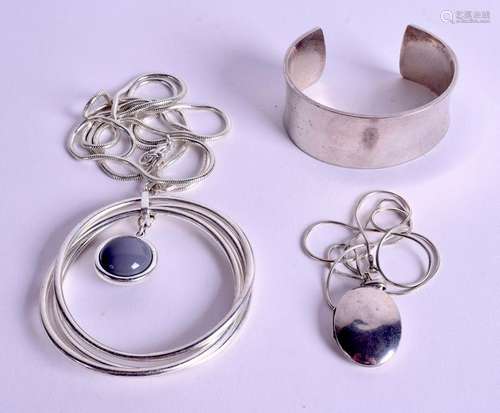 A DESIGNER SILVER BANGLE together with two necklaces.