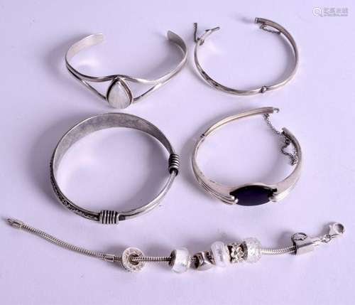 FIVE SILVER BANGLES. 120 grams. (5)