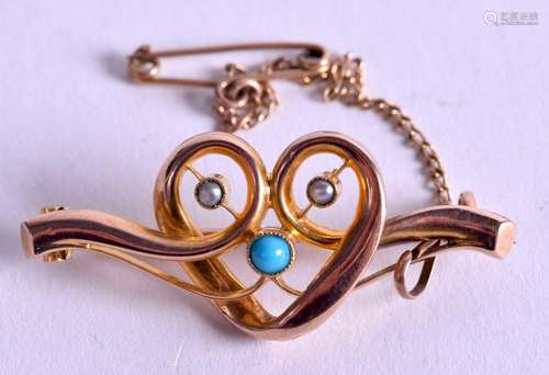 A 9CT GOLD TURQUOISE BROOCH. 3.3 grams. 3.75 cm wide.