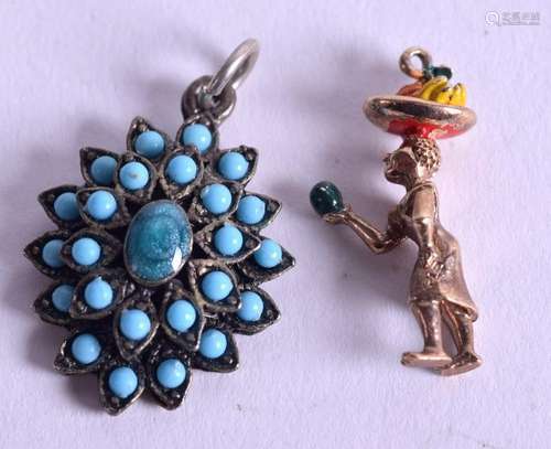 A VINTAGE GOLD AND ENAMEL CHARM together with a