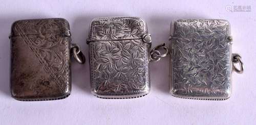 THREE SILVER VESTA CASES. (3)