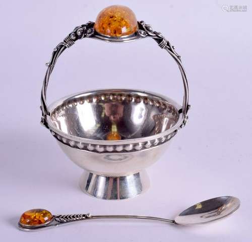 AN ARTS AND CRAFTS STYLE POLISH SILVER AND AMBER SUGAR