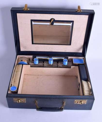 A LOVELY TRAVELLING SILVER AND ENAMEL VANITY CASE,