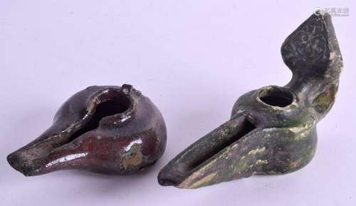 TWO CENTRAL ASIAN KASHAN POTTERY OIL LAMPS. Largest 16