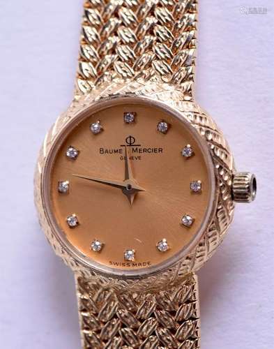 AN 18CT GOLD BAUME AND MERCIER WRISTWATCH. 36.3 grams.