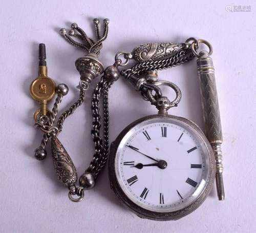 AN ANTIQUE SILVER FOB WATCH with chain. 2.5 cm diameter