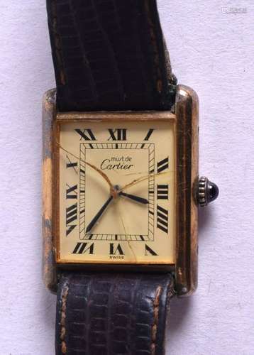 A VINTAGE SILVER GILT CARTIER WRISTWATCH. 2 cm x 2.25