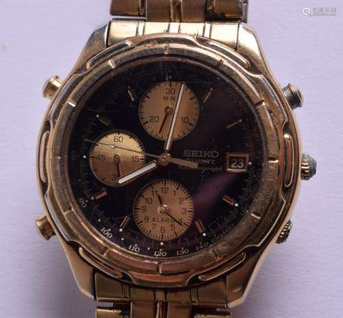 A SEIKO BLACK DIAL WRISTWATCH. 3.5 cm wide.