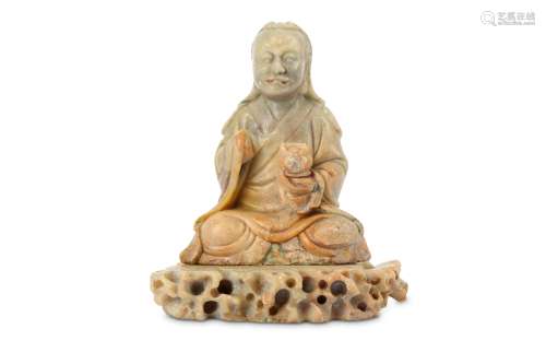 A CHINESE SOAPSTONE FIGURE OF A LUOHAN.