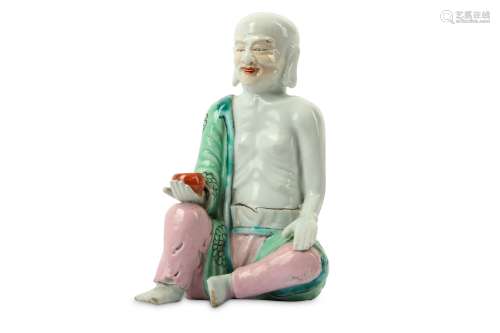 A CHINESE FAMILLE ROSE FIGURE OF A LUOHAN.