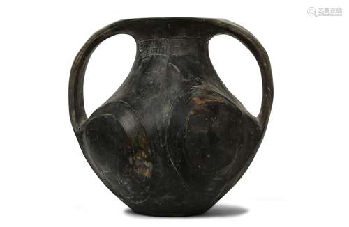 A CHINESE BLACK POTTERY JAR.