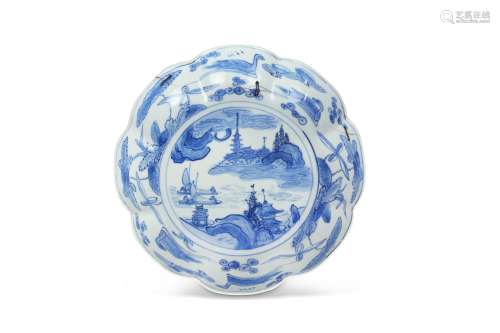 A CHINESE BLUE AND WHITE LOBED 'LANDSCAPE' DISH.