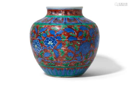 A CHINESE ENAMELLED BLUE AND WHITE JAR.