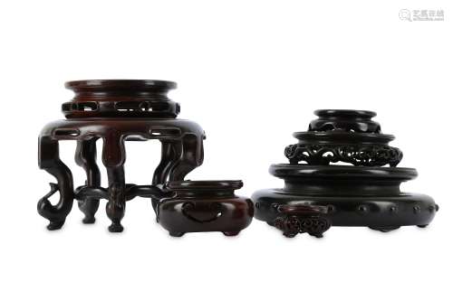 SEVEN CHINESE HONGMU STANDS.