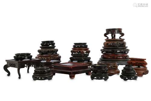 A COLLECTION OF CHINESE WOOD STANDS.