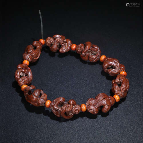 CHINESE WALNUT KERNEL CARVED BEAD BRACELET