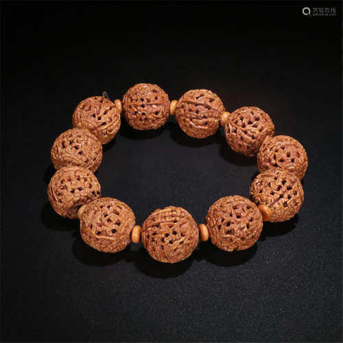 CHINESE WALNUT KERNEL CARVED BEAD BRACELET