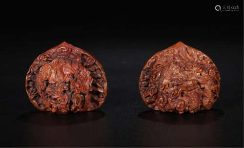 PAIR OF CHINESE WALNUT KERNEL CARVED TABLE ITEM