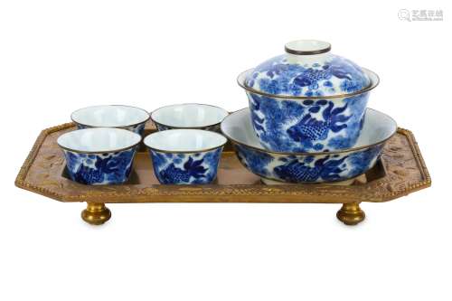 A CHINESE BLUE AND WHITE 'GOLDFISH' TEASET AND TRAY.