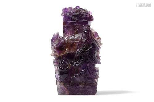 A CHINESE AMETHYST 'GUANYIN' VASE AND COVER.