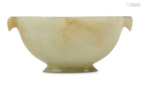 A CHINESE PALE CELADON JADE TWIN HANDLED CUP.