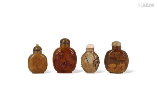 FOUR CHINESE AGATE SNUFF BOTTLES.