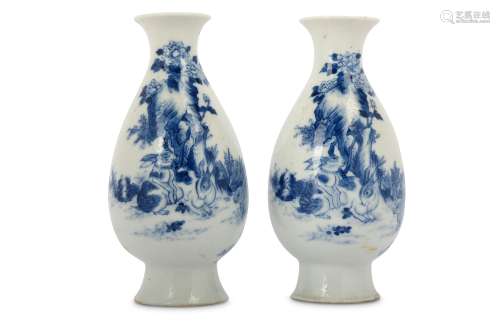 A PAIR OF CHINESE BLUE AND WHITE 'HARES' VASES.