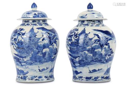 A PAIR OF CHINESE BLUE AND WHITE JARS AND COVERS.