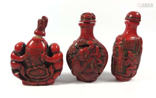 THREE ORIENTAL CORAL TYPE RED FIGURAL SNUFF BOTTLES