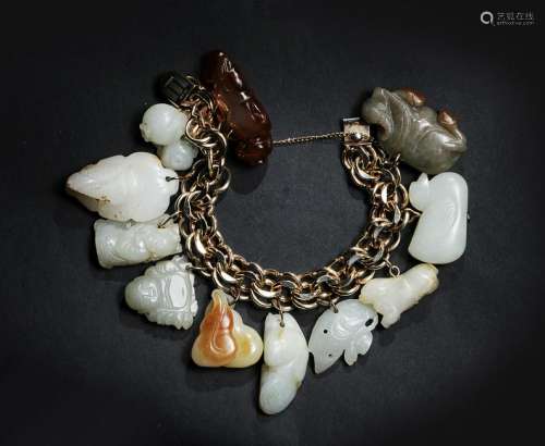 Chinese Charm Bracelet with 10 Jade, 1 Agate Carving
