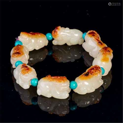 CHINESE WHITE JADE BEAST BEAD BRACELET