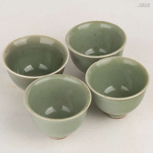 A Set of Four Celadon Porcelain Cups