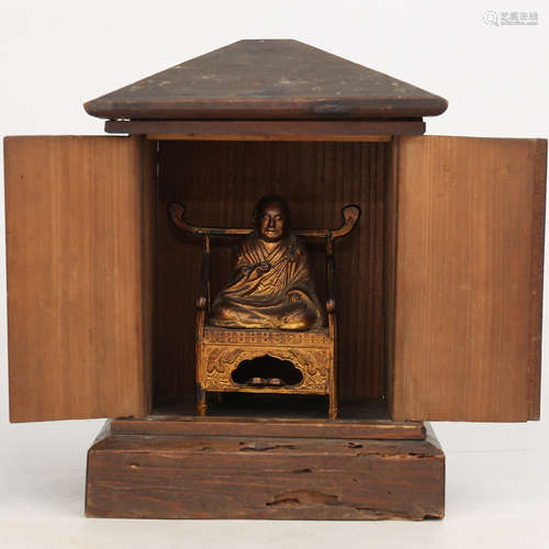 A Chinese Gilt Bronze Buddha with Wood Cabinet