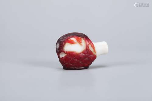 A Chinese White and Red Peking Glass Snuff Bottle
