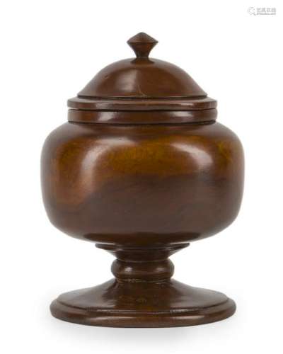 A koa wood lidded urn